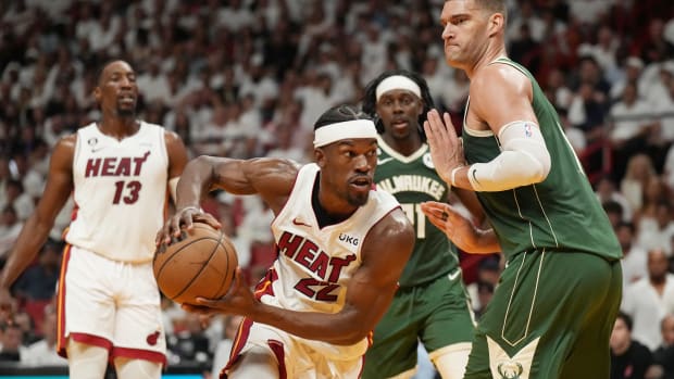 Heat forward Jimmy Butler drives to the basket against the Bucks Monday night.